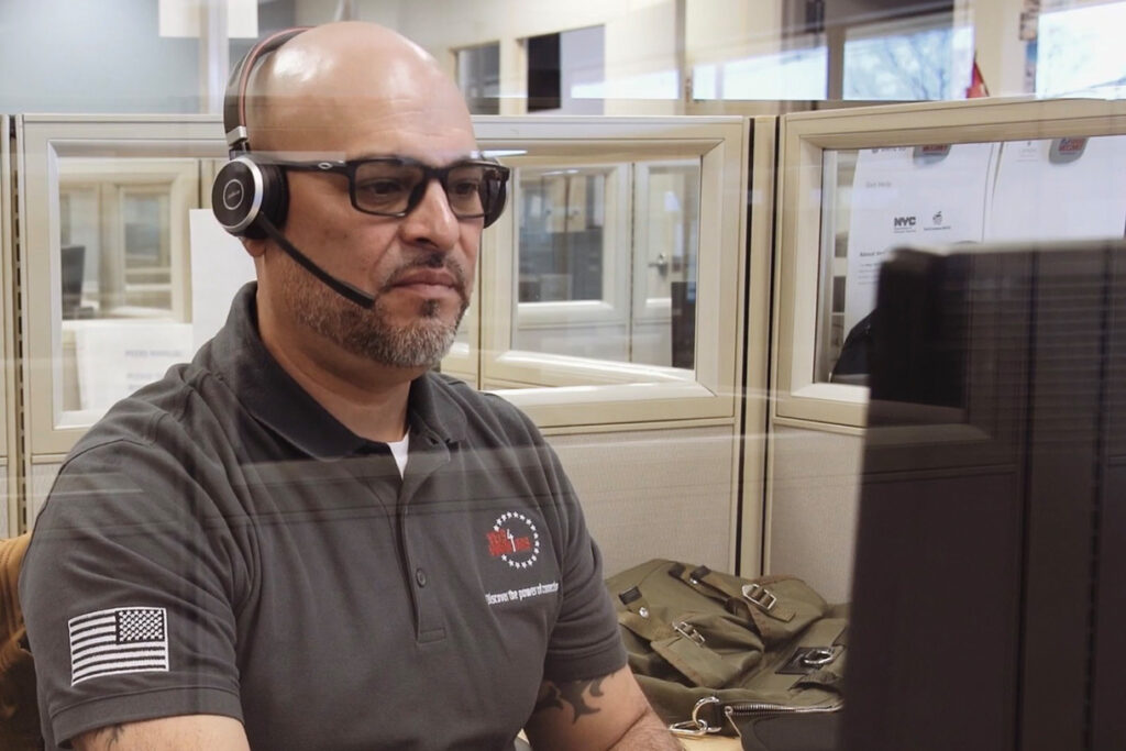 Vets4Warriors member listening on the phone